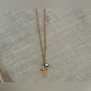 Gold Cross Necklace with Blue Gemstone